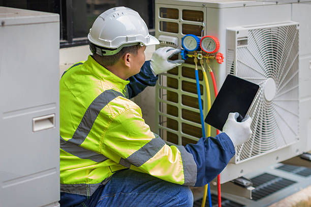 Professional Heat Pump Repair technician working in Seattle, WA